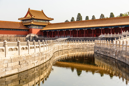 One of the Inner yards in the emperor forbidden city wit moat, stone fence and decorated tower, Beijing, Chinaのeditorial素材