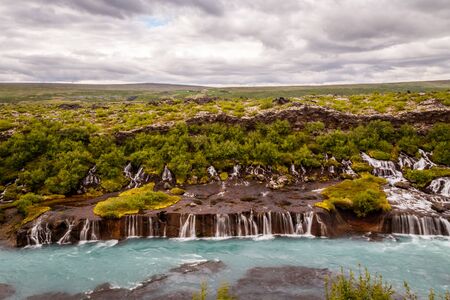 Hraunfossar waterfall streams falling into Hvita river, Husafell, Western Icelandの写真素材