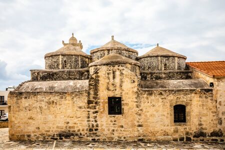 Agia Paraskevi old stone with domes and bell tower Byzantine Church in Geroskipou village, Cyprusの写真素材