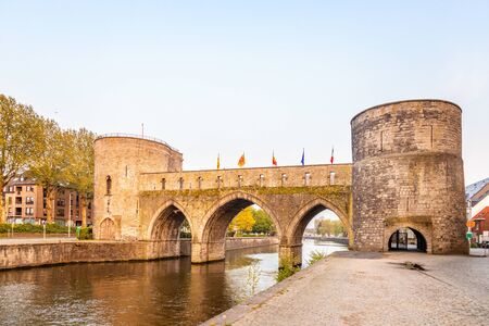 Bridge of holes or Pont des Trous, the medieval bridge across the river Escaut, Tournai, Belgiumの写真素材