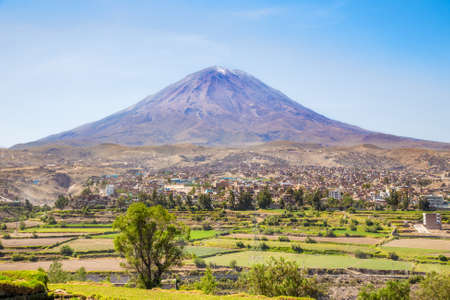 Dormant Misti Volcano over the streets and houses of peruvian city of Arequipa, Peruの写真素材