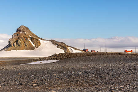 Antarctic landscape with mountains and argentinian Camara base station, Half Moon island, Antarctic peninsulaの写真素材