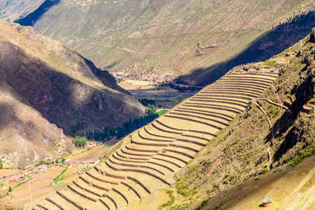 Ancient Incan farm terraces on the mountain slope, Pisac, Peru