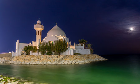 White Salem Bin Laden Mosque built on the island in the moonlight with sea in the background, Al Khobar, Saudi Arabiaの写真素材