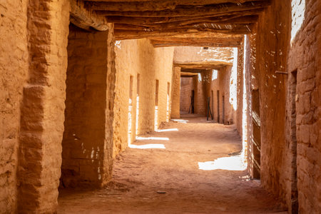 Al Ula old town street between mud bricked walls , Saudi Arabiaの写真素材