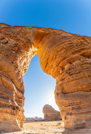 Arch of sandstone elephant rock erosion monolith standing in the desert, Al Ula, Saudi Arabiaの写真素材