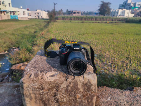 Kolhapur, Maharashtra,India- December 5th 2020;Top view of black color Nikon D5300 DSLR camera with...