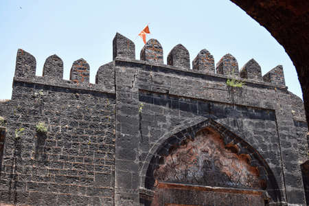 Panhala,Maharashtra,India-May 5th 2019;stock photo of popular ancient Panhala fort near kolhapur city,front door of a ancient fort constructed using black rocks.Picture captured under bright sunlightのeditorial素材