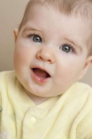 Sixth Month Baby with Tear in Eyeの写真素材