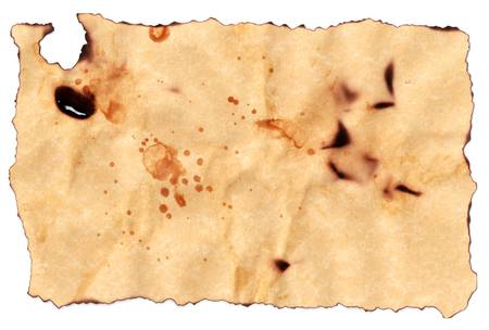 Parchment paper with burned edges, stains and marksの写真素材