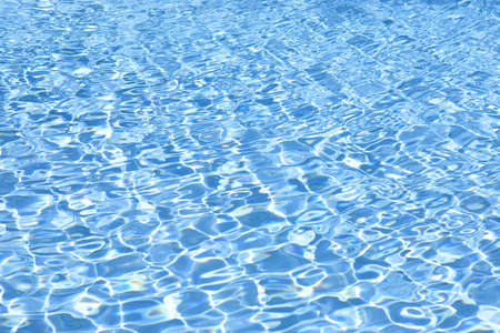 View of swimming pool water texture and ripples
