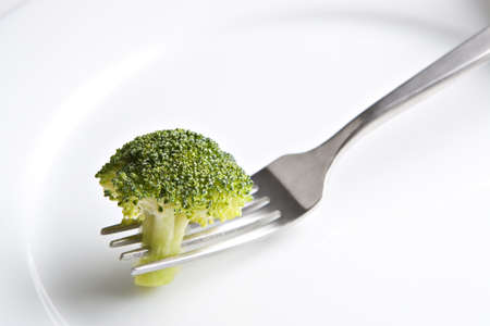 Fork on Plate with Broccoliの写真素材