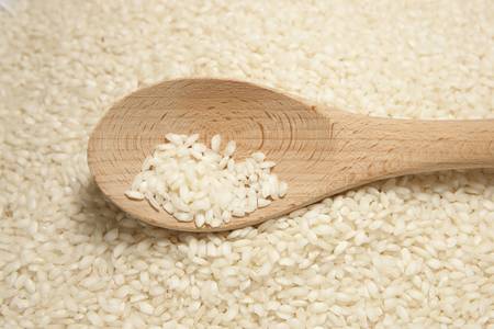 Arborio Rice with Spoonの写真素材
