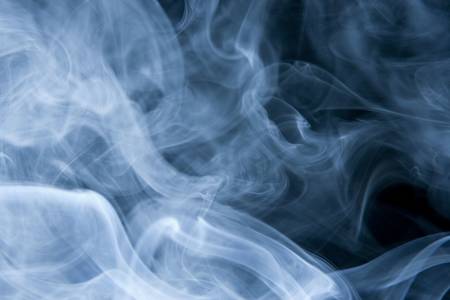 Swirls of Blue Smoke on Blackの写真素材