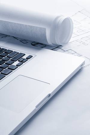 Blueprints with Laptop Computerの写真素材