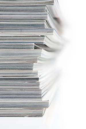 Stack of Magaines on White Background with Extreme Shallow Depth of Field