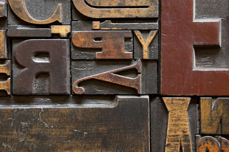 Old printing press letters arranged randomly across. Focus across entire surface.の写真素材