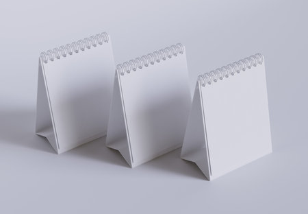 Blank spiral notebook mockup, 3D rendering isolated on gray backgroundの写真素材
