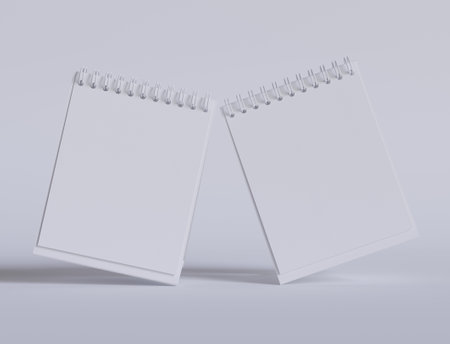Blank spiral notebook mockup isolated on grey background 3D renderingの写真素材