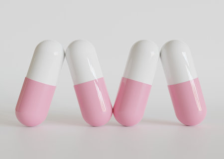 3d rendering of pink pills on white background with copy space.の写真素材