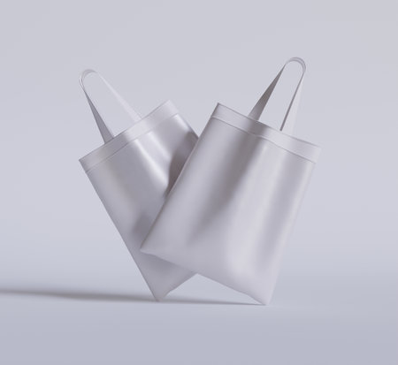 White shopping bags isolated on white background. 3d render illustration.の写真素材