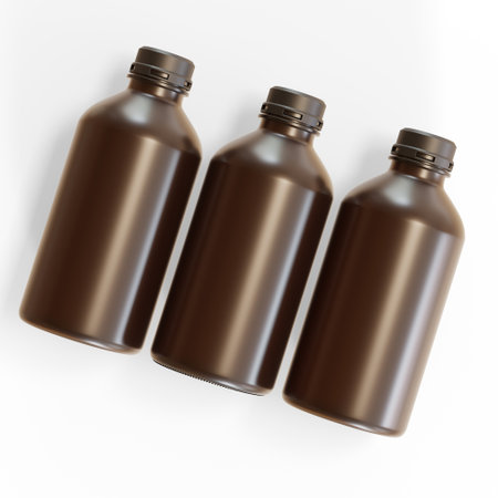Mockup of three brown plastic bottles isolated on white background.