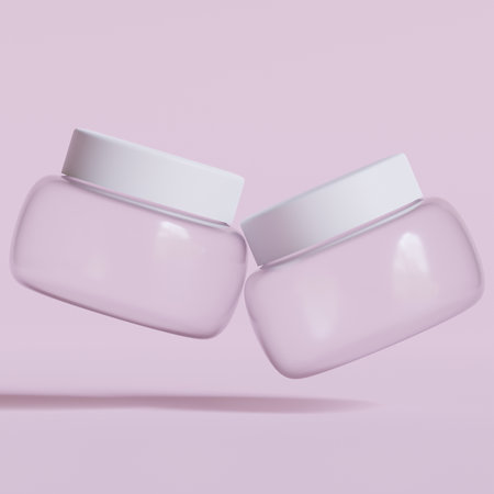 3d rendering of two white cosmetic jars on a pink background.の写真素材