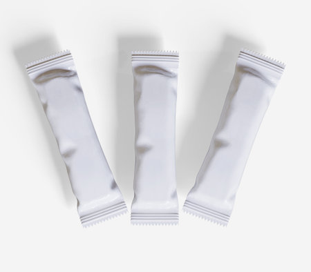 3d rendering of a group of white tube packaging mockup isolated on white backgroundの写真素材