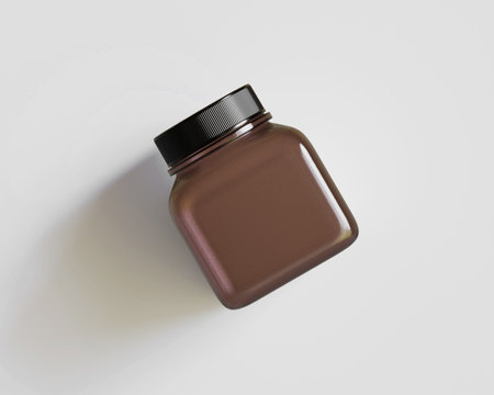 Mockup of a brown cosmetic bottle isolated on white background.の写真素材