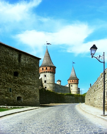 medieval castle and cobbled roadの写真素材