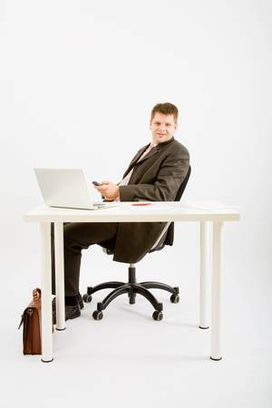 Young business man working in officeの写真素材