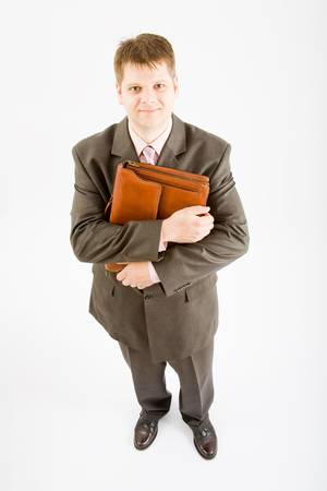 Young business man with bag on white bakcgroundの写真素材