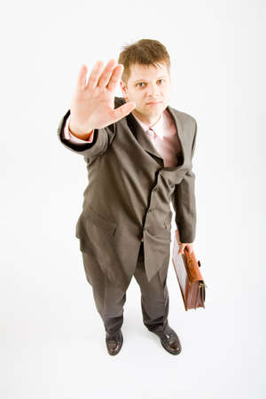 Young business man with bag on white bakcgroundの写真素材