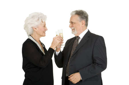 elegant elderly couple toastingの写真素材