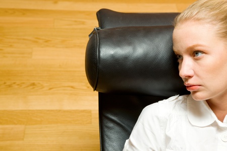 woman lying on chaise longueの写真素材