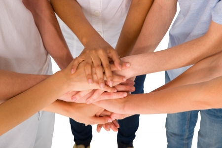 teenagers with hands togetherの写真素材