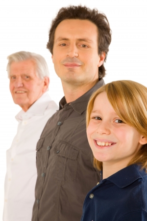 father gandfather with son nephew standing on white backgroundの写真素材