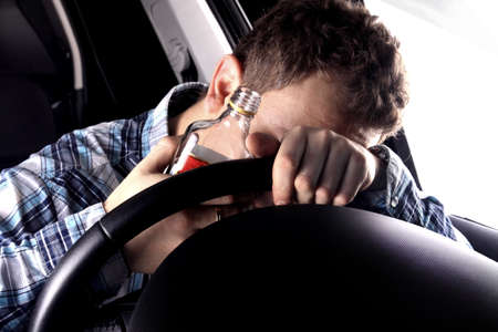 Drunk driver sleeping in the car