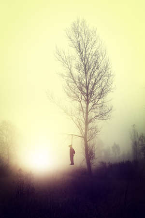 terrible mystery story - hanged on a treeの写真素材