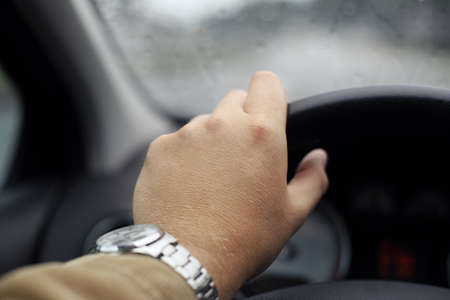 rainy autumn day on the road in car
