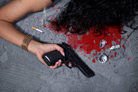 Cold blooded murder-woman after the attack lies in a pool of bloodの写真素材