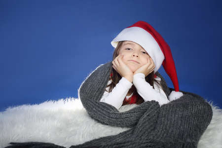 Bored young girl in Santaの写真素材