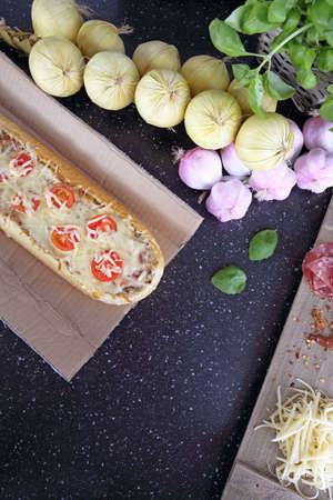 fast food delicious toast with cheese and vegetables and hamの写真素材