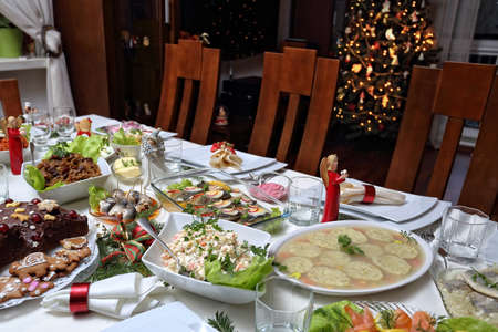 Traditionally laid table on Christmas Eveの写真素材