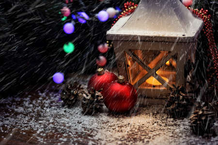 Christmas lantern in winter magical Christmas eveningの写真素材