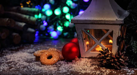 Family atmosphere of Christmas - lantern and cookies