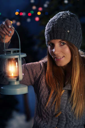 Smile girl with lanternの写真素材