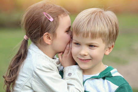 boy and girl playing outside