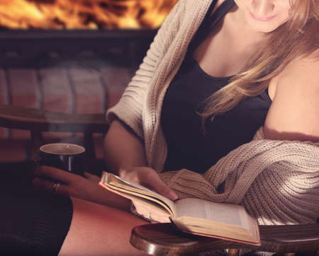 peace and relaxation at home by the fireplaceの写真素材