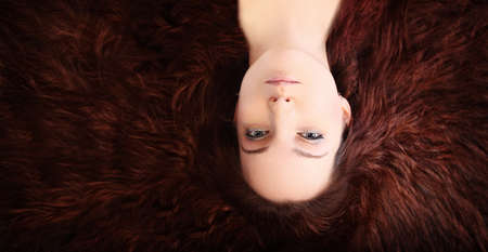 Young woman with lush hairの写真素材